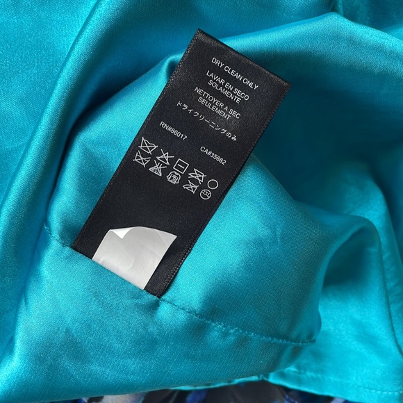 Bebe Blue Turquoise Leopard Halter Mini Dress. Zip up back. Size small - Picture 8 of 8